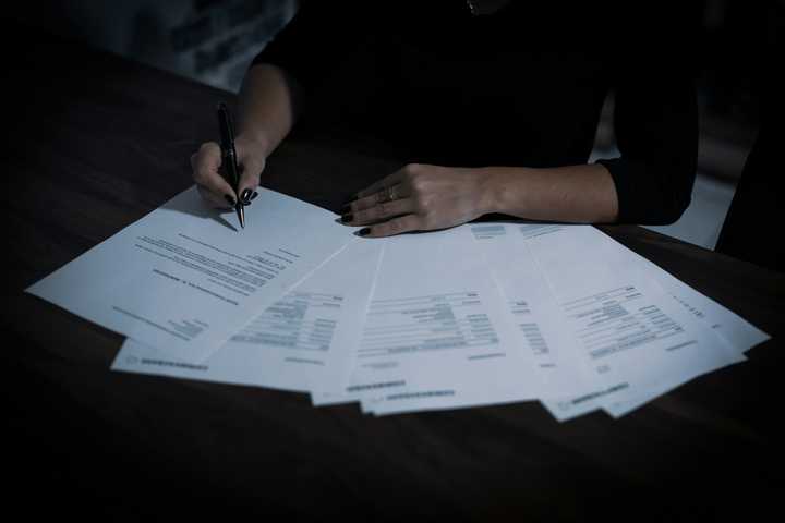 A person signing contracts
