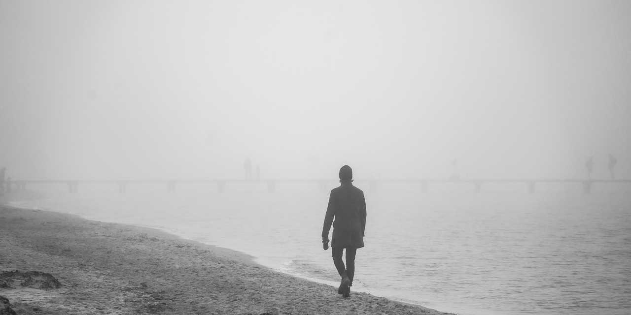 Person på stranden.